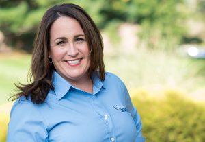 woman hygienist brunette standing outside posing for image