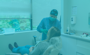 Dental Hygienist with patient in dental practice in Albany, NY